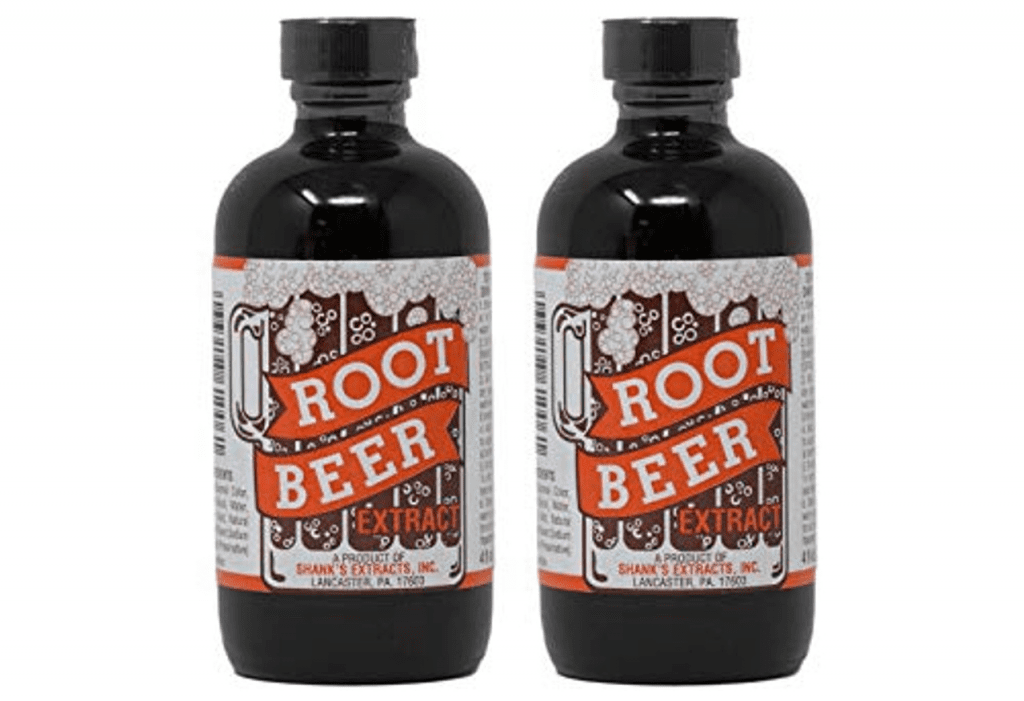 two glass bottles of root beer extract