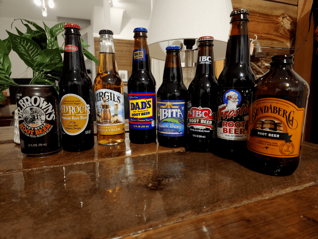 assorted brands of root beer soda