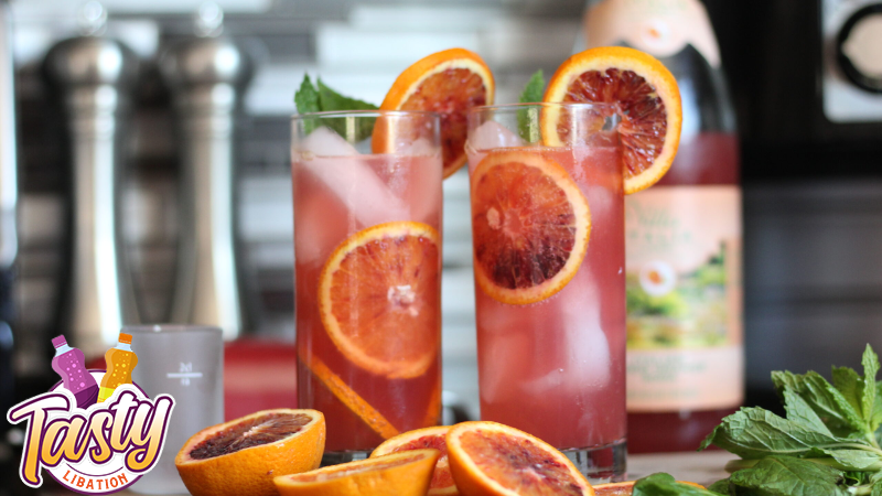 two glasses of orange soda cocktail
